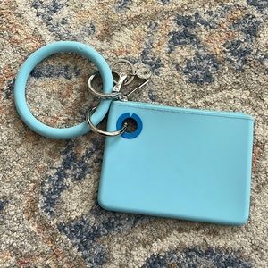 Oventure key ring and mini pouch. Sweet Carolina color. Great condition.